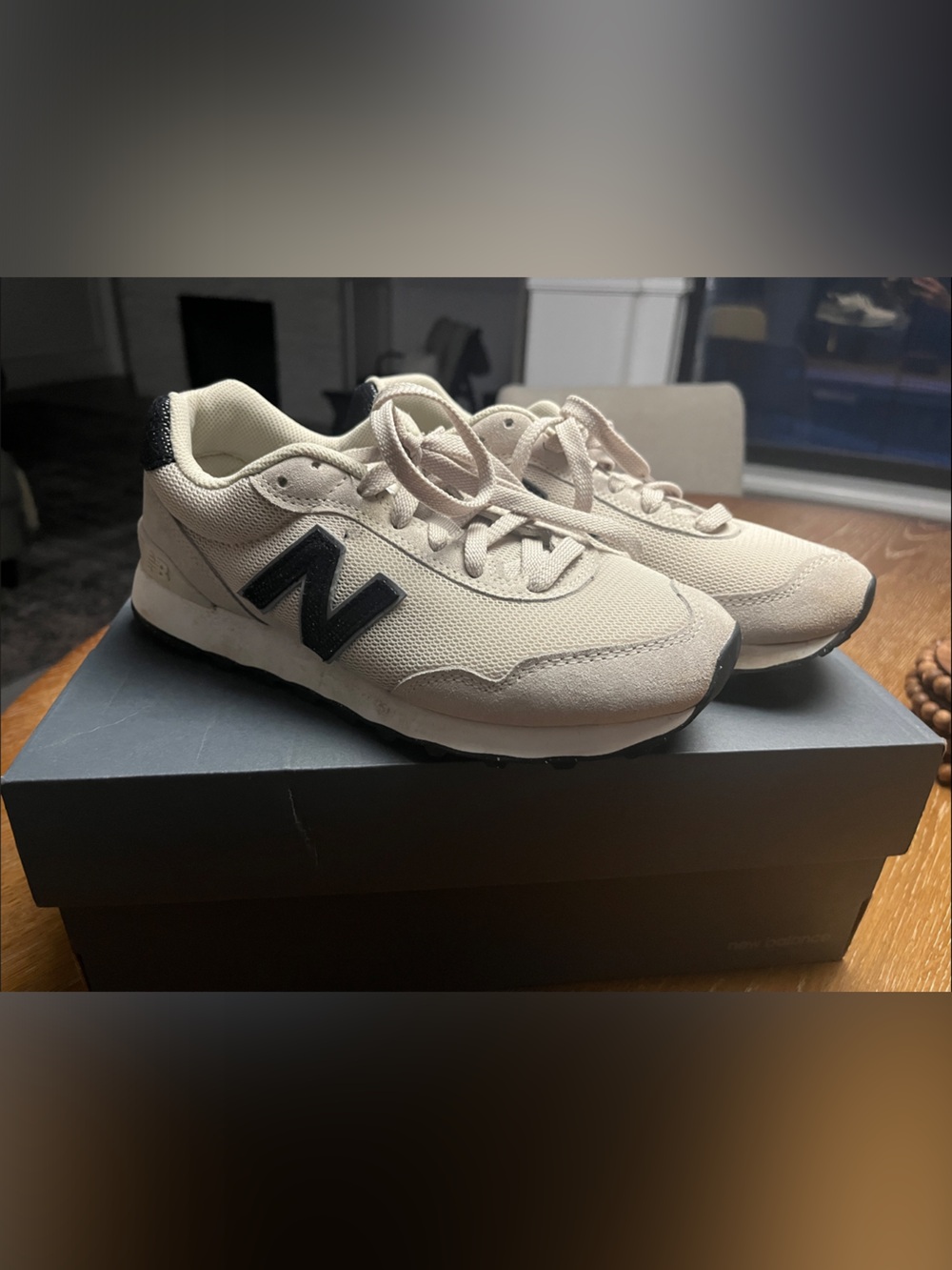 New Balance Woman’s  Cream Sneaker with dark navy blue 'N' Accent
